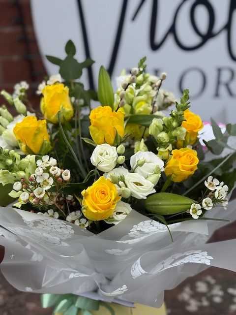 Stunning yellow roses with white lisianthus