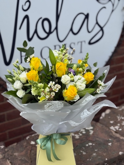 Stunning yellow roses with white lisianthus
