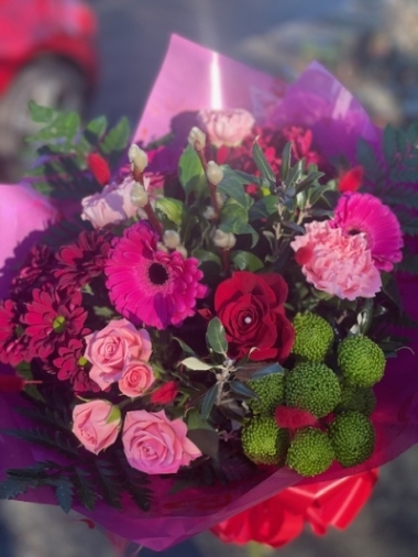Hand tied in stunning shades of pink